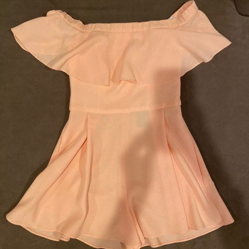 Penelope Playsuit in pebble crepe fabric.